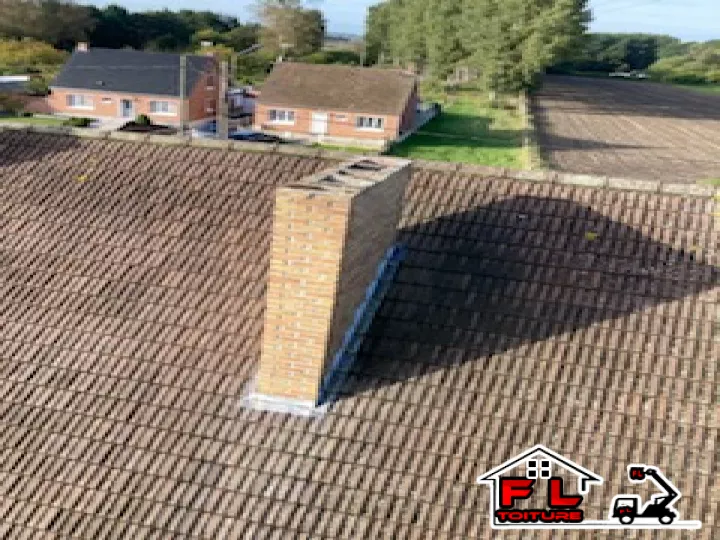 bruay lez marchiennes photo de la cheminée à supprimée sur la toiture 